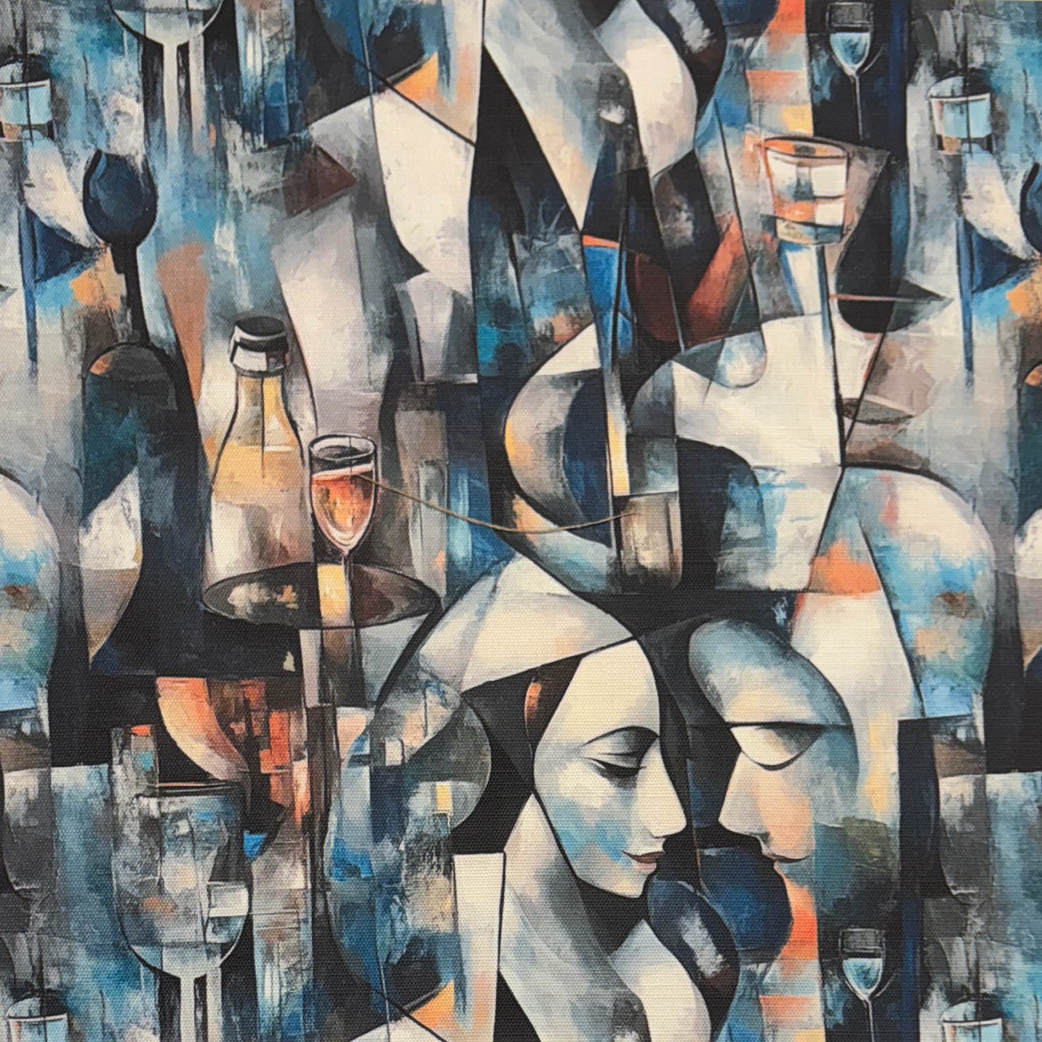 Flat lay of Mougin No.32 blue upholstery fabric with abstract face and glassware motifs