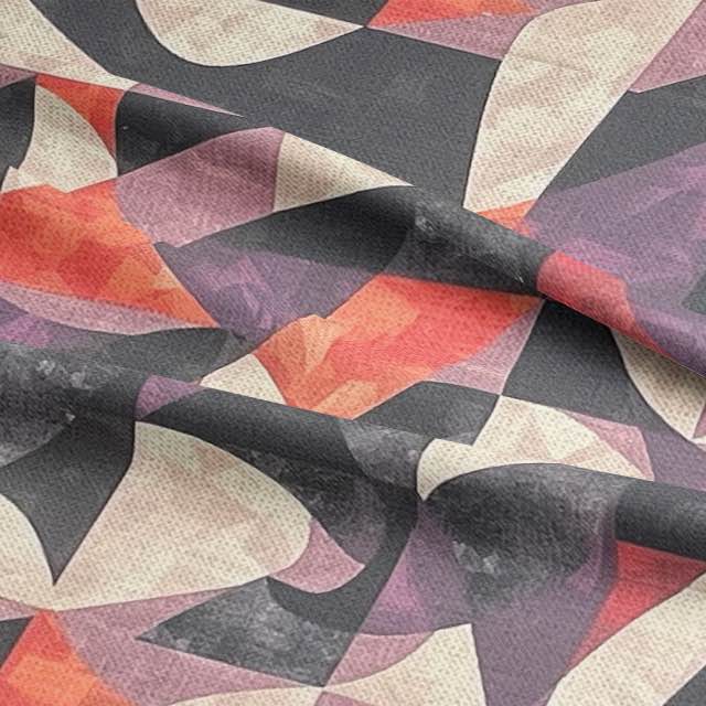 Close-up of designer upholstery fabric with sculptural abstract pattern in purple tones