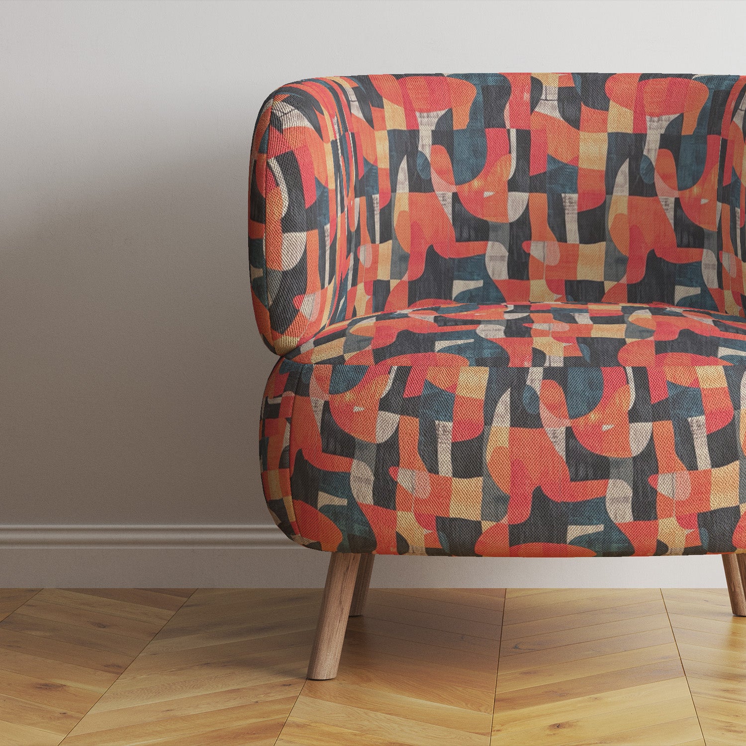 Movements No.5 styled on accent chair – bold orange and navy curved pattern upholstery fabric