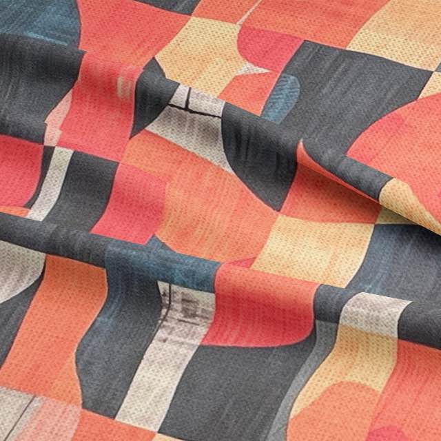 Close-up of statement upholstery fabric with painterly orange and charcoal design