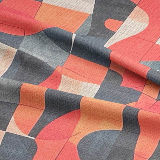 Close-up of sculptural upholstery fabric in terracotta, cream and slate tones