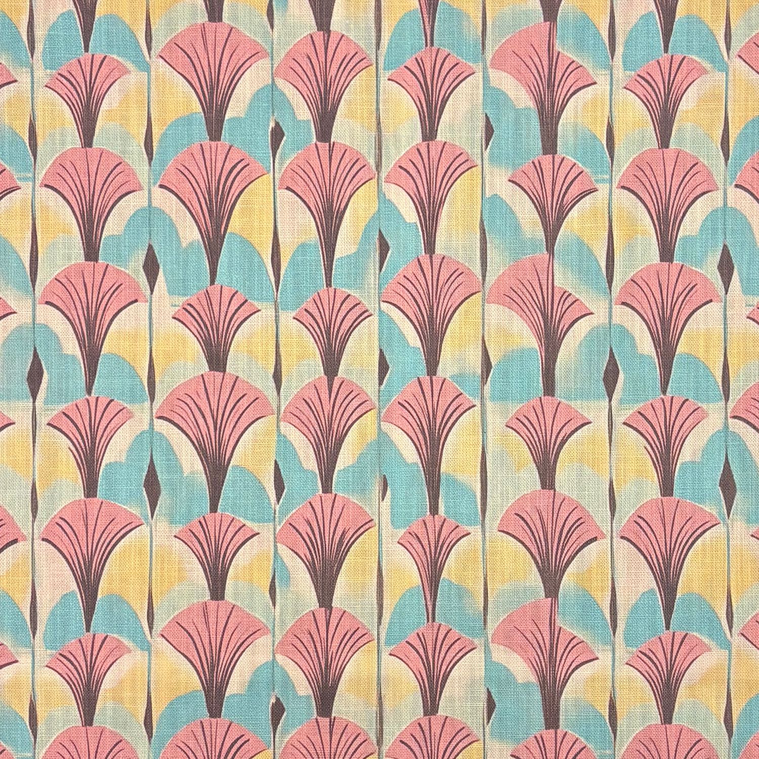 Flat lay of Nouveau No.6 fabric showing pink floral pattern with yellow and aqua background