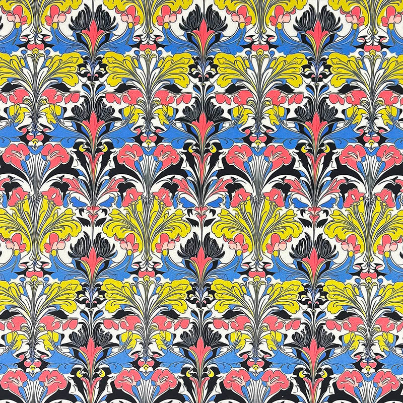 Art Nouveau printed velvet upholstery fabric featuring colourful floral motifs in blue, yellow, pink and black with decorative botanical detailing