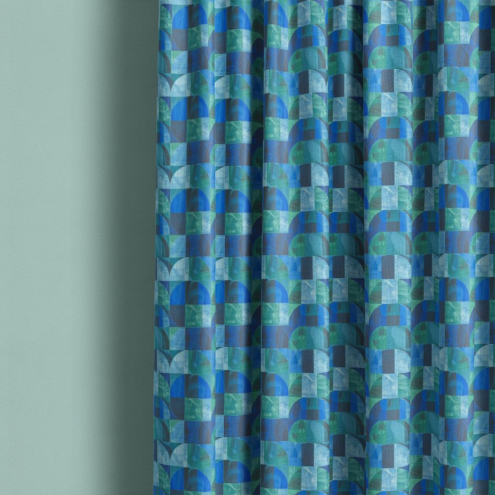 Palette No.7 geometric curtain fabric flat view showing abstract semi-circle pattern in blue and green on dark background