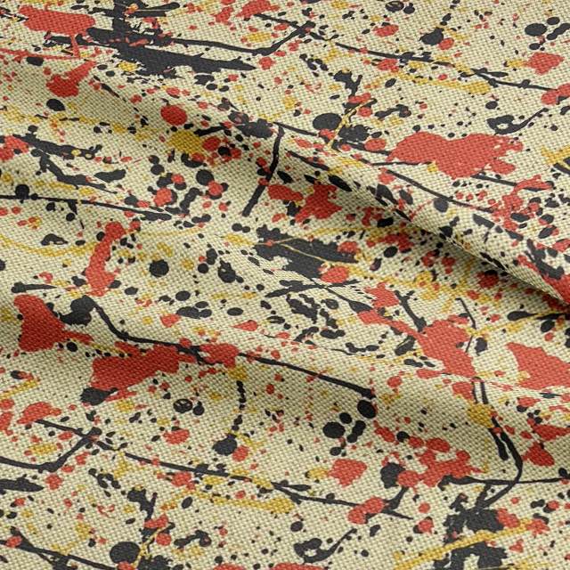 Close-up of statement cream upholstery fabric with modern splatter print