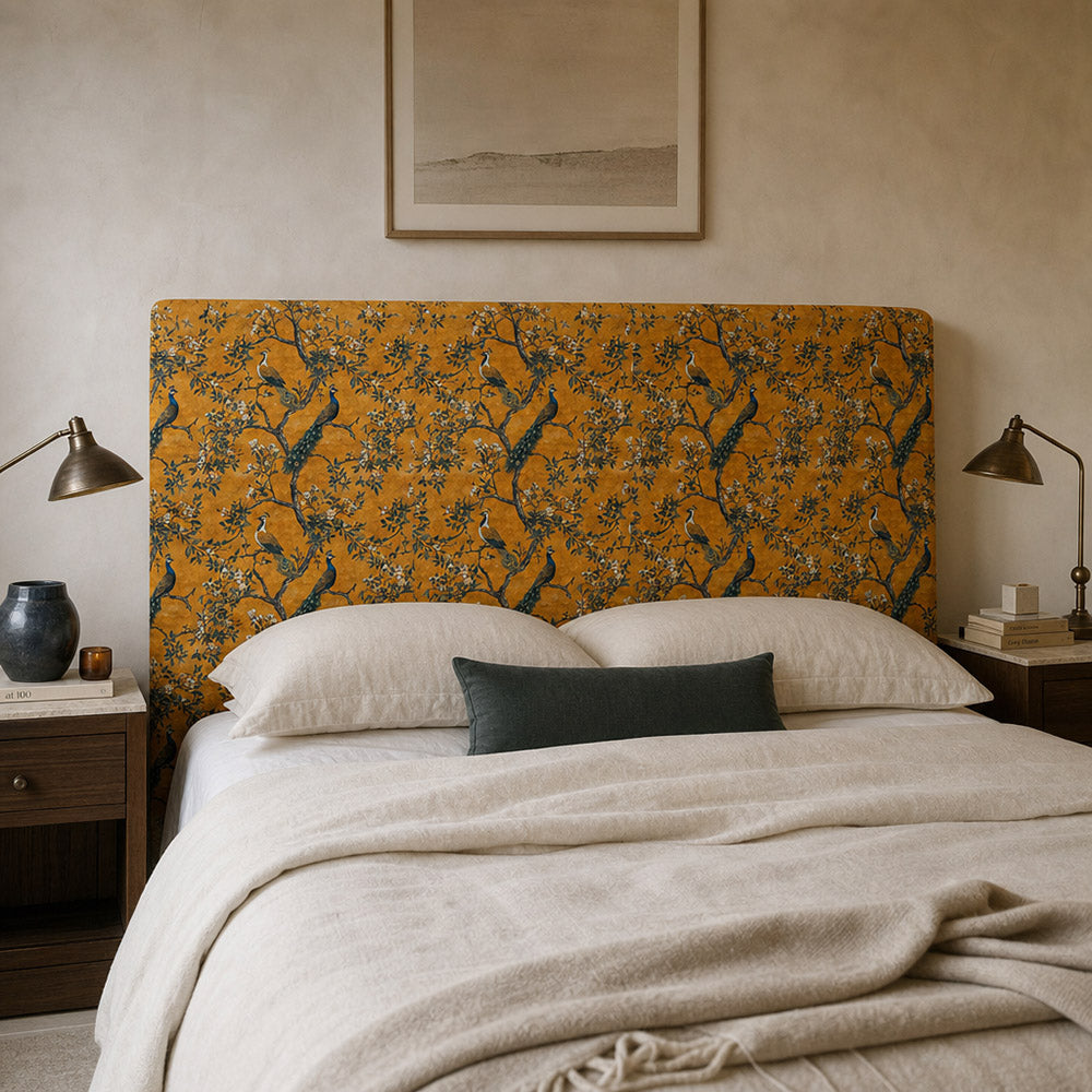 Statement headboard upholstered in Pavone No.4 ochre peacock velvet fabric