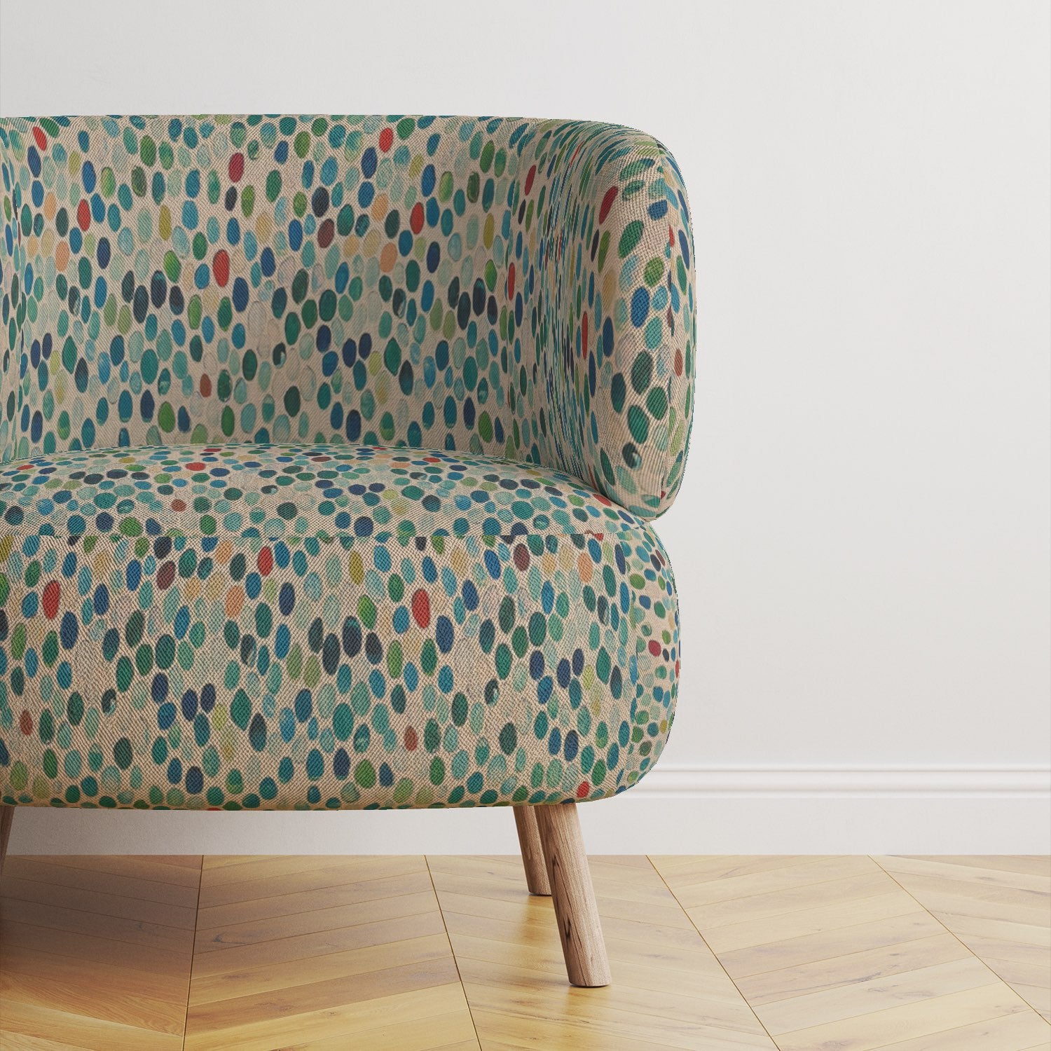Chair upholstered in Pointillia No.9 multicoloured upholstery fabric with pebble design.