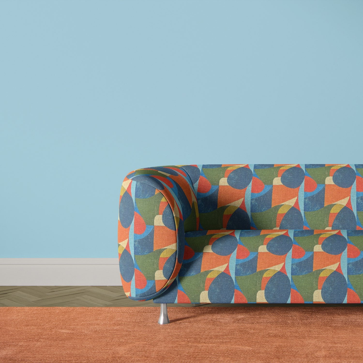 Populist No.11 multicoloured blue and olive upholstery fabric on contemporary sofa – Saint and Poet