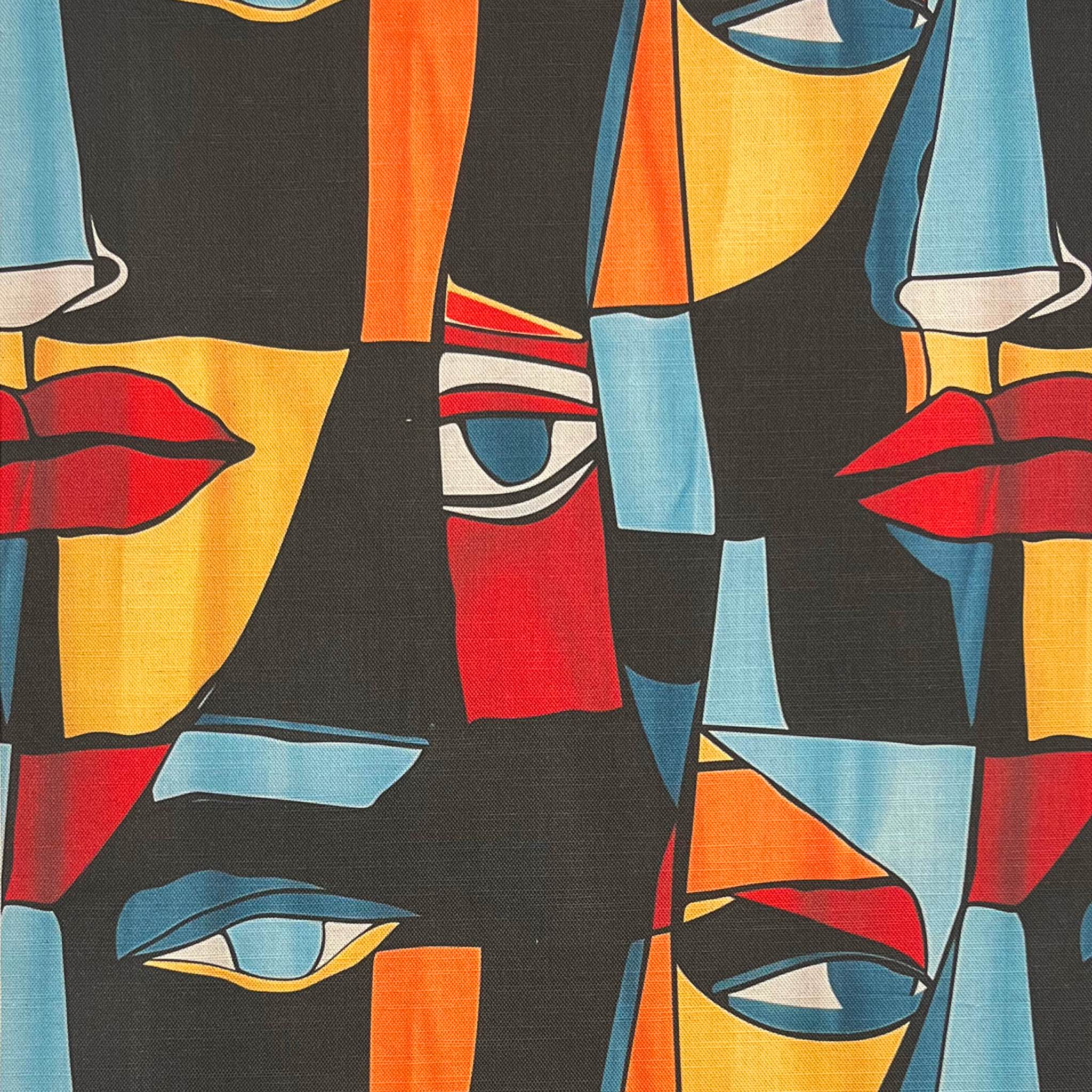 Multicoloured abstract upholstery fabric with surrealist faces – flat lay