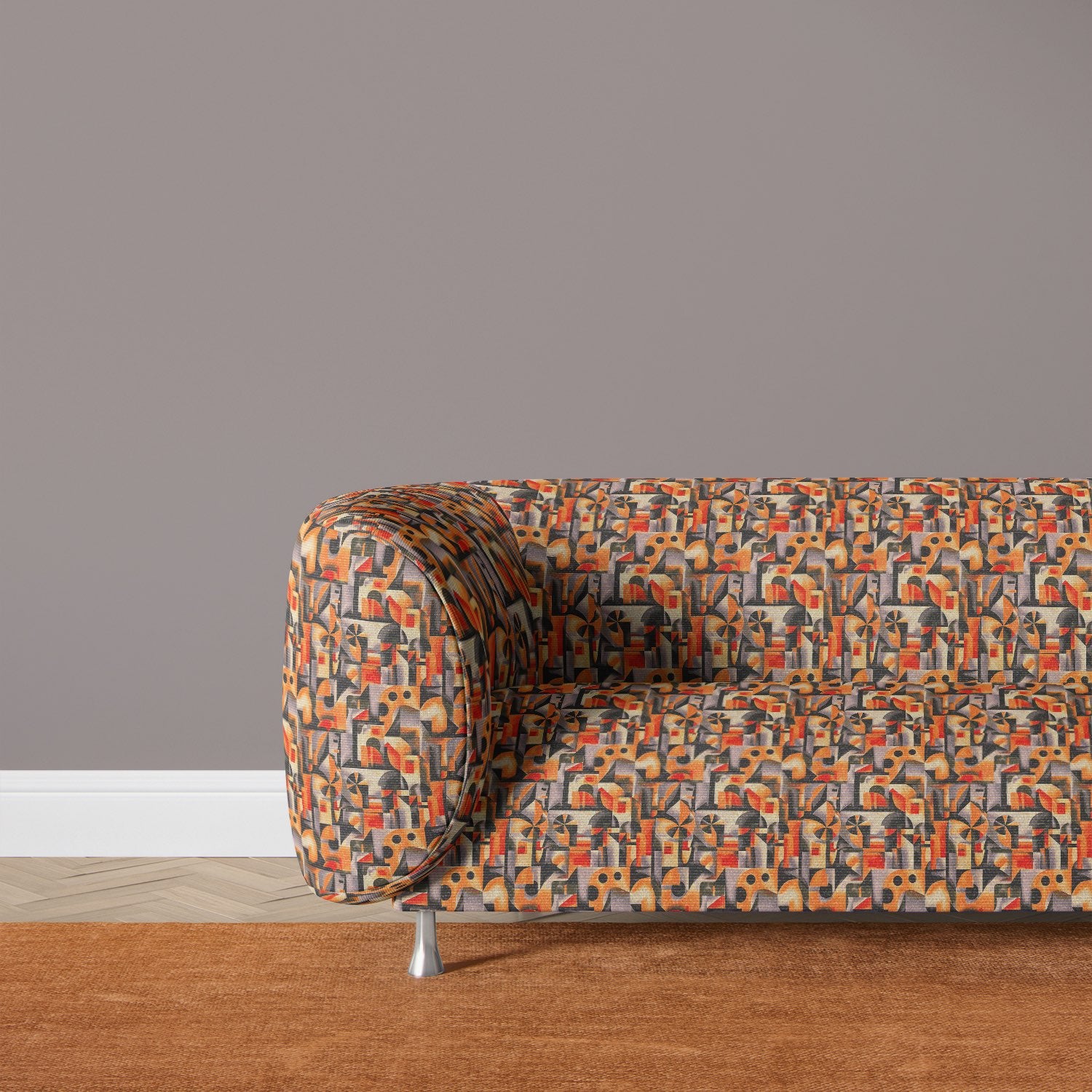 Chair upholstered in sculptural fabric with warm orange tones