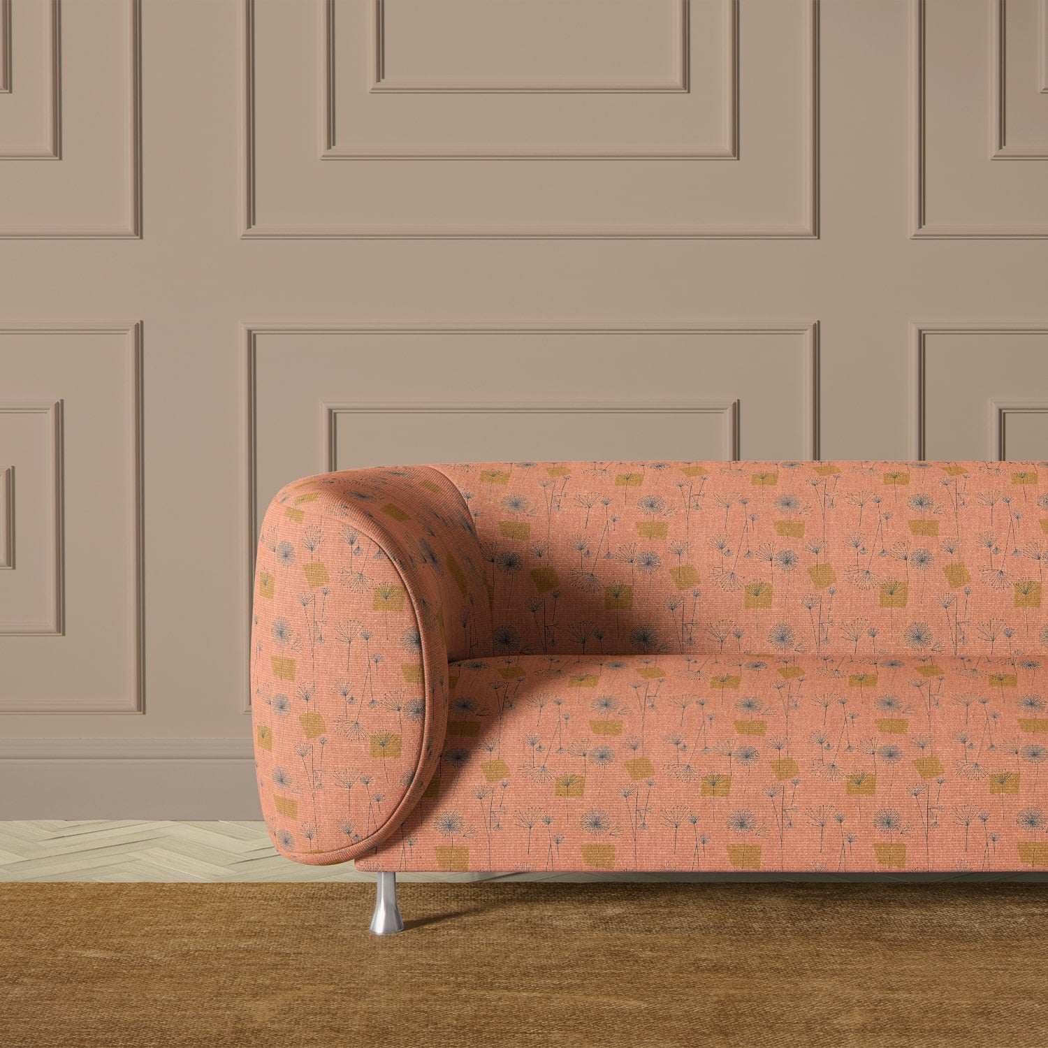 Mid-century sofa upholstered in pink and ochre abstract dandelion fabric
