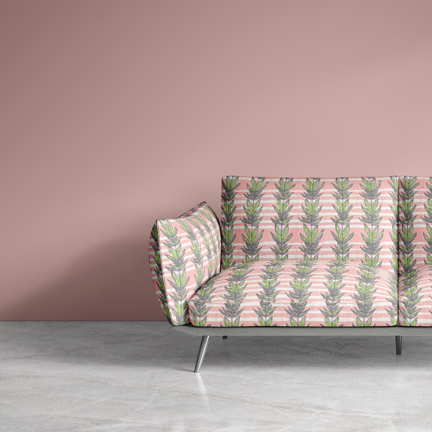 Statement sofa upholstered in retro pink and green botanical fabric