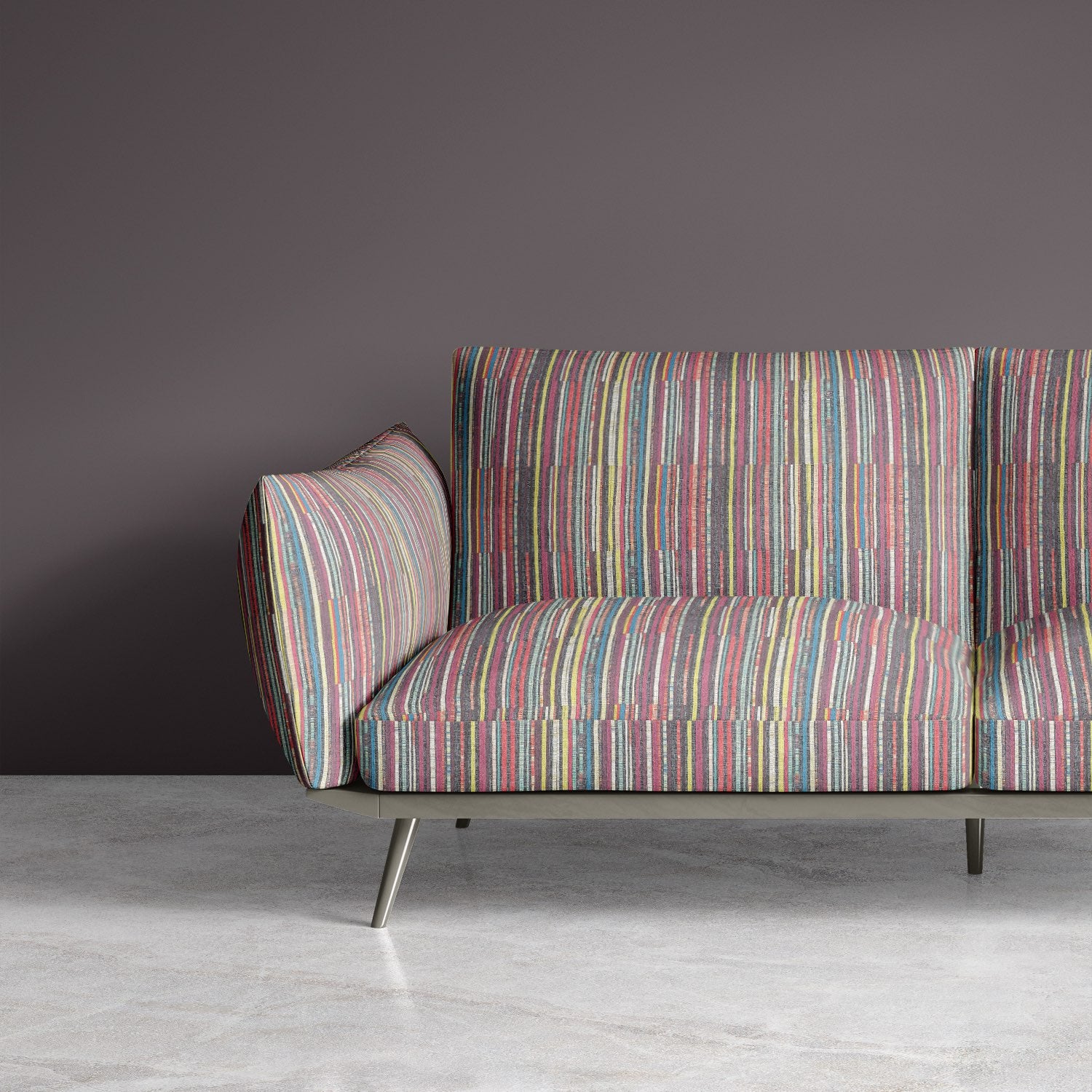Sofa upholstered in Striped No.12 upholstery fabric with multicoloured linear pattern in pink, sage, ochre, and sea blue