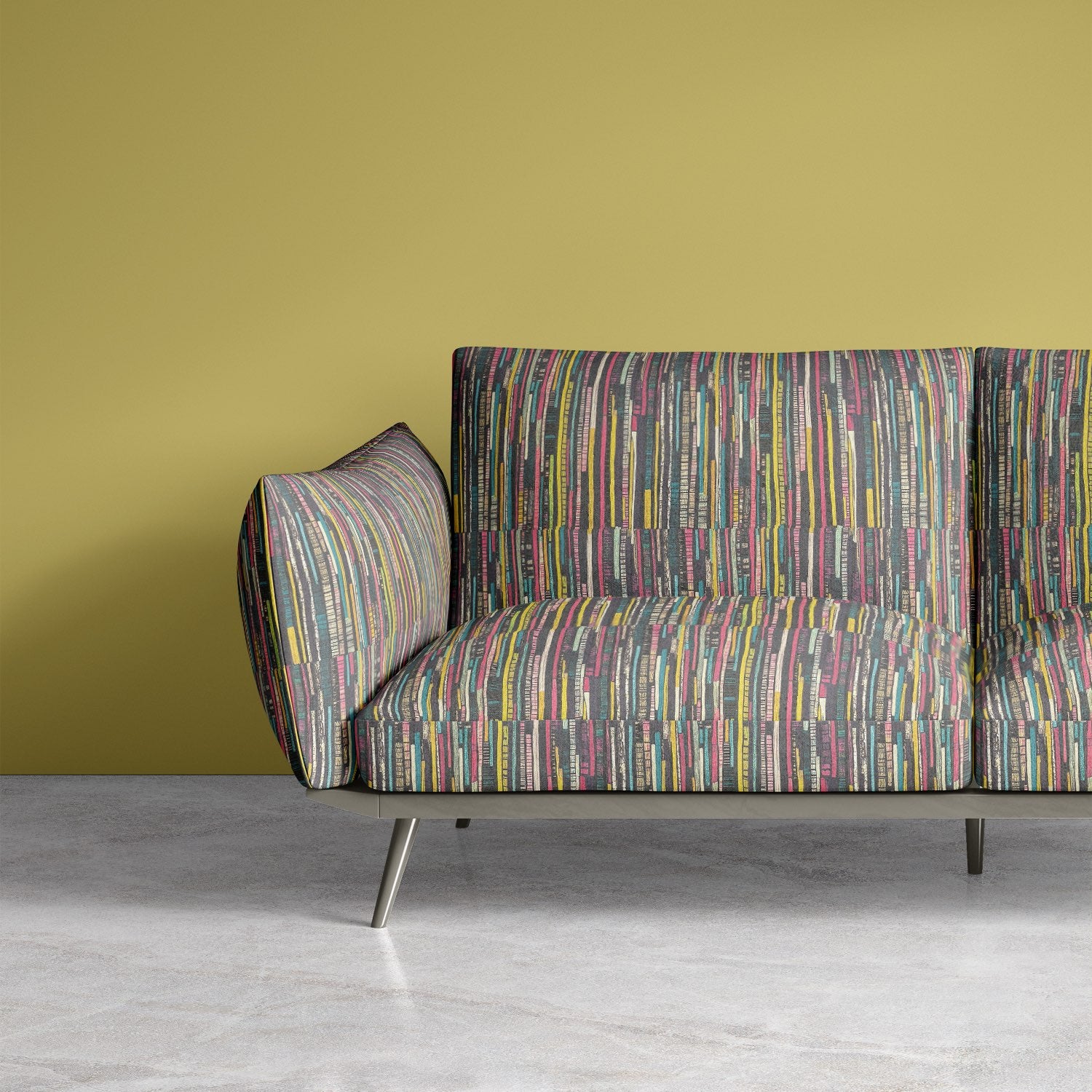 Sofa upholstered in Striped No.4 upholstery fabric with bold painterly multicoloured stripes