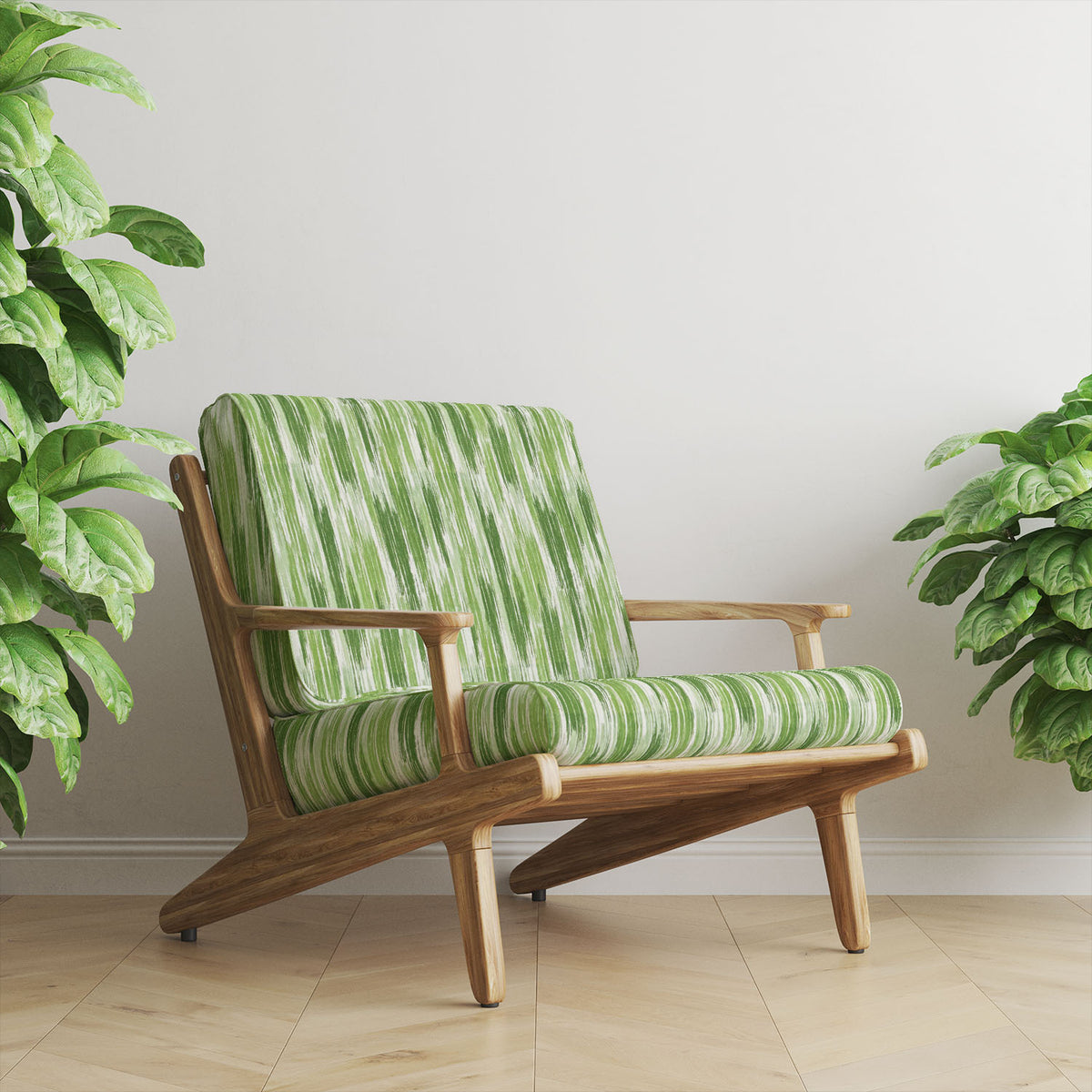 Striped No.29 lime, moss and forest green stripe Crib5 velvet upholstery fabric shown on a statement chair
