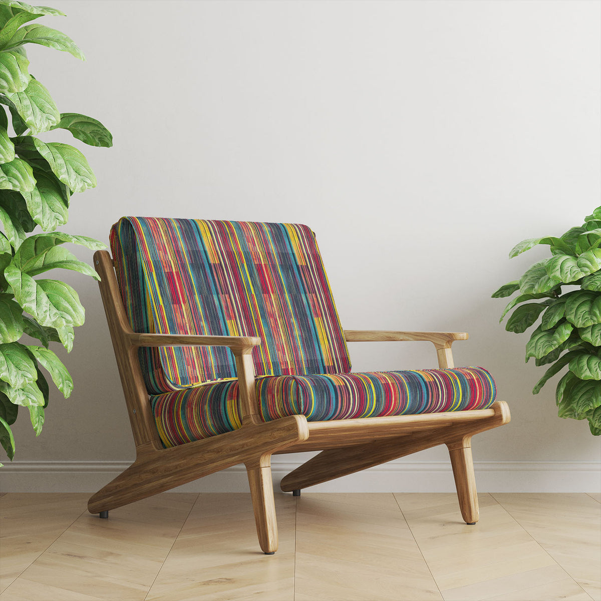 Striped No.9 coral, ochre, teal, yellow and cobalt narrow stripe Crib5 velvet upholstery fabric shown on a statement chair