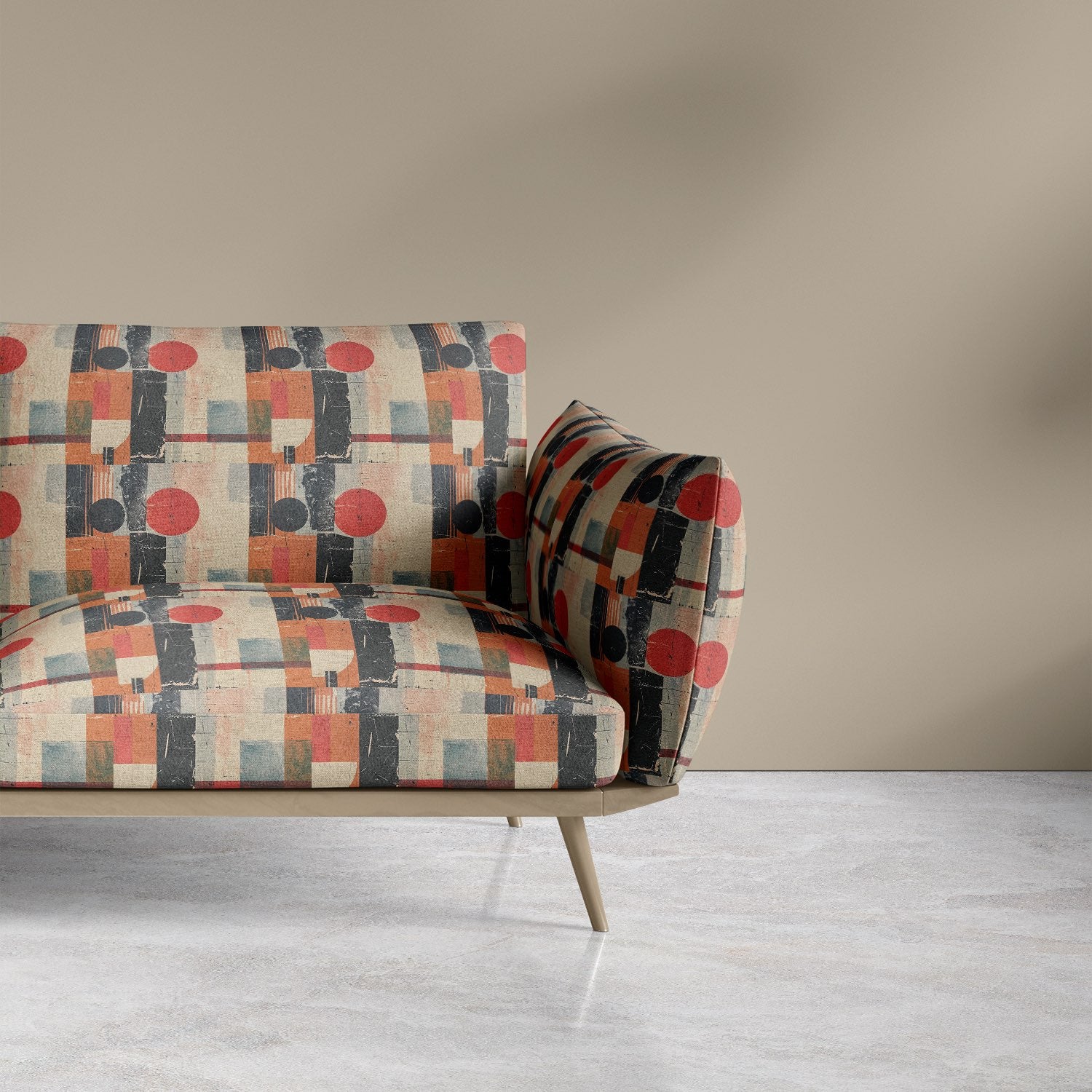 Graphic sofa upholstered in red, black and blue geometric fabric