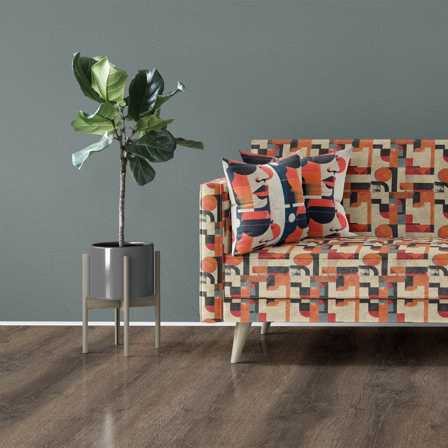 Modern sofa upholstered in orange geometric patterned fabric