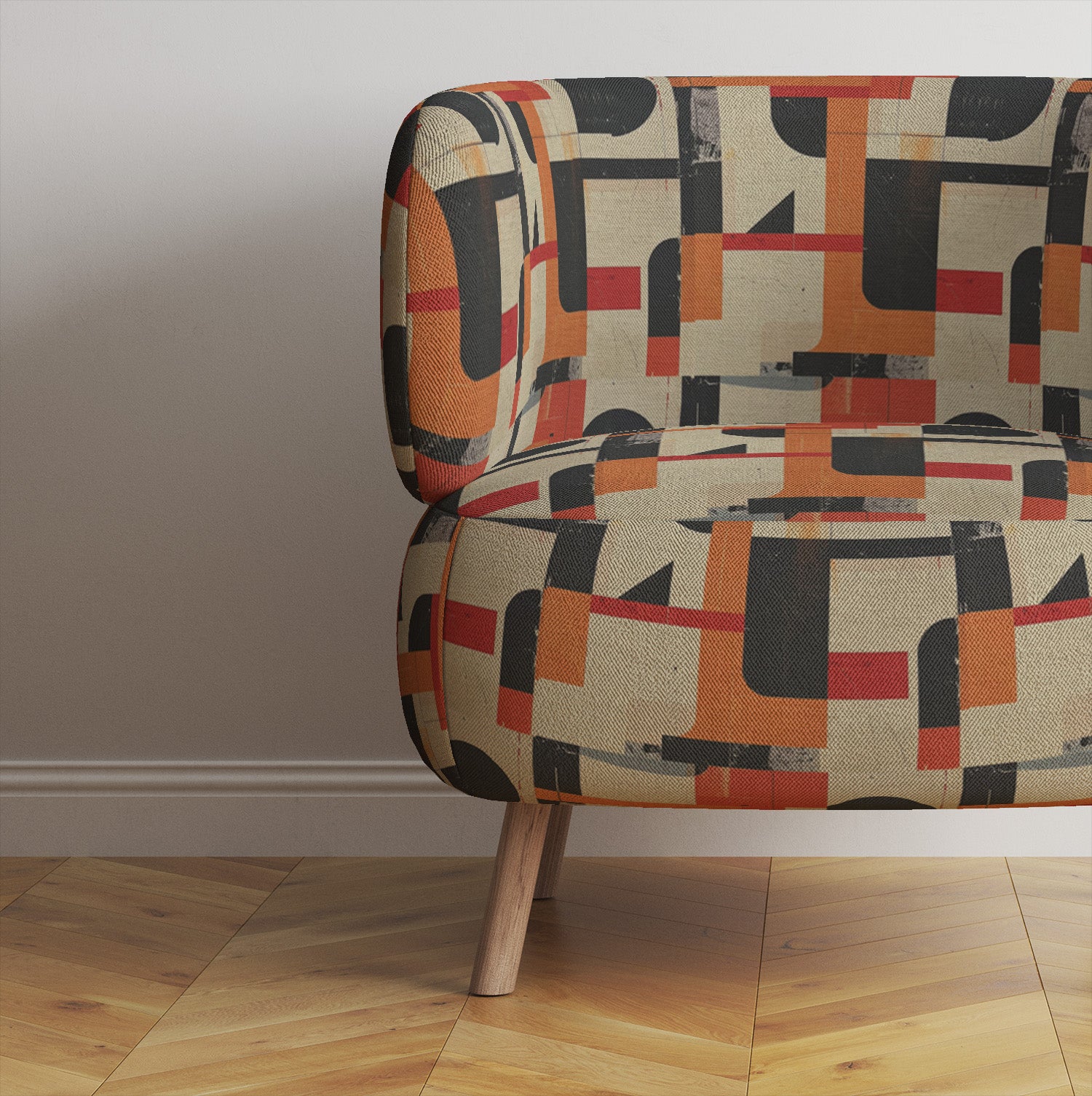 Accent chairs upholstered in mid-century inspired geometric fabric