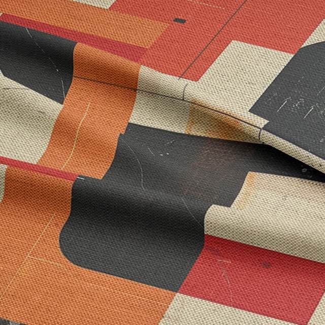 Upholstery fabric with bold orange, black, and cream shapes