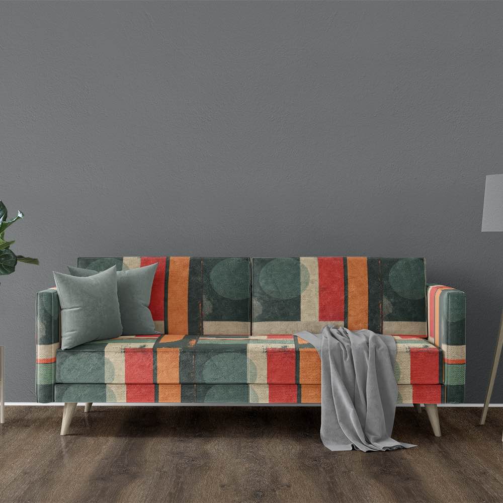 Modern sofa upholstered in teal and rust vintage abstract fabric