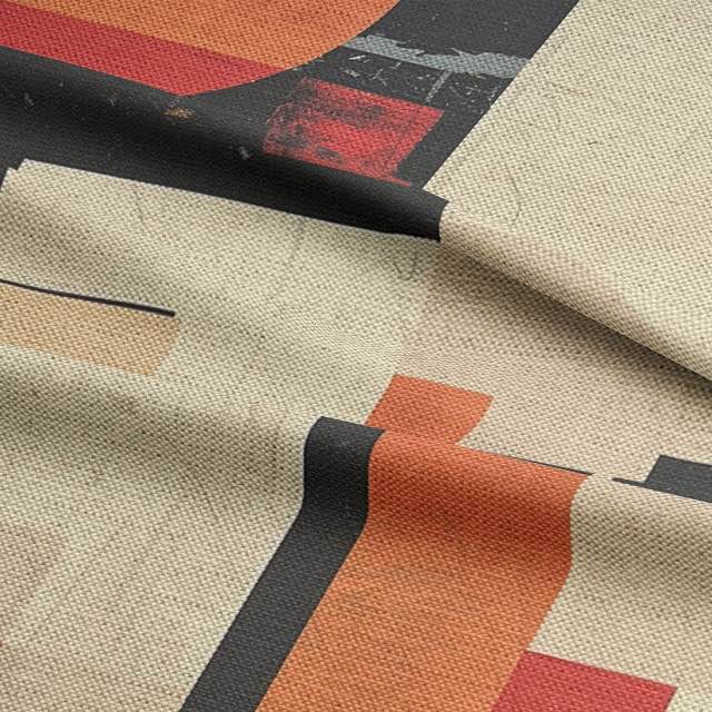 Upholstery fabric in beige, red, and black with distressed patterns