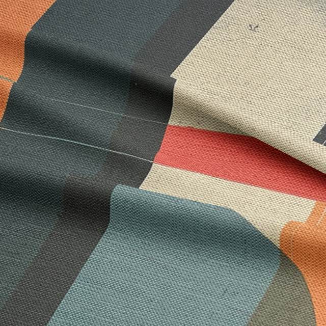 Upholstery fabric with retro lines and circles in teal, orange, and stone