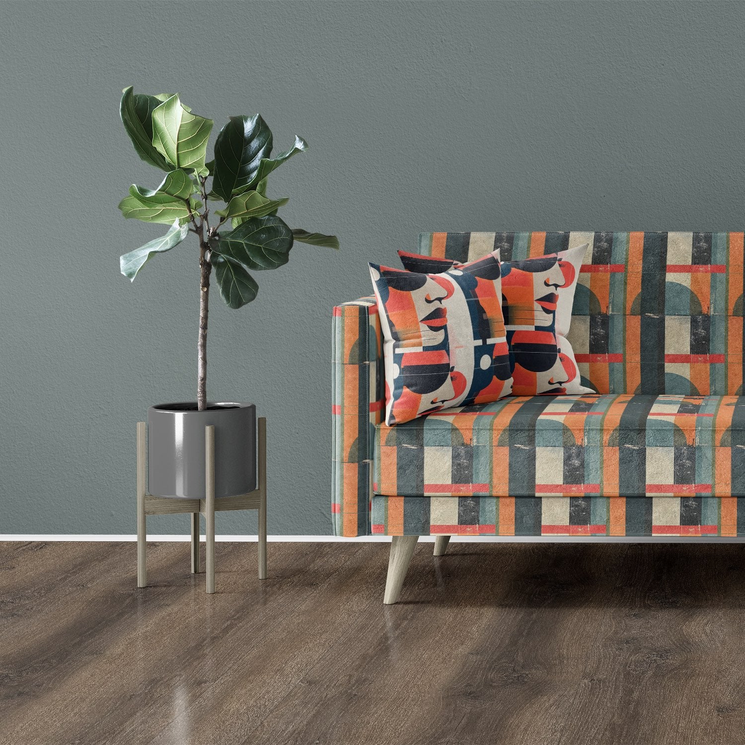 Mid-century sofa in distressed teal and clay geometric upholstery