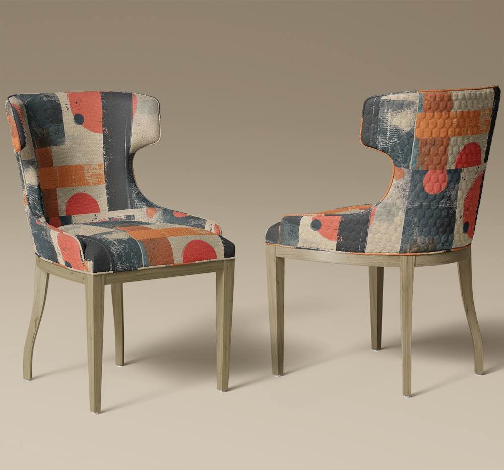 Pair of chairs in distressed abstract upholstery fabric in red, orange and charcoal