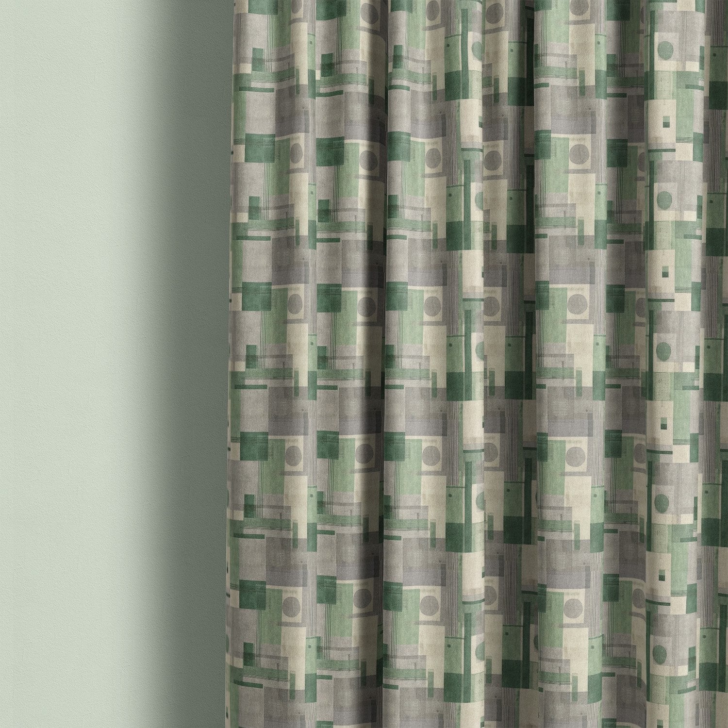 Texture No.11 green linen curtain fabric hanging in soft folds showing structured geometric design with layered green and neutral tones