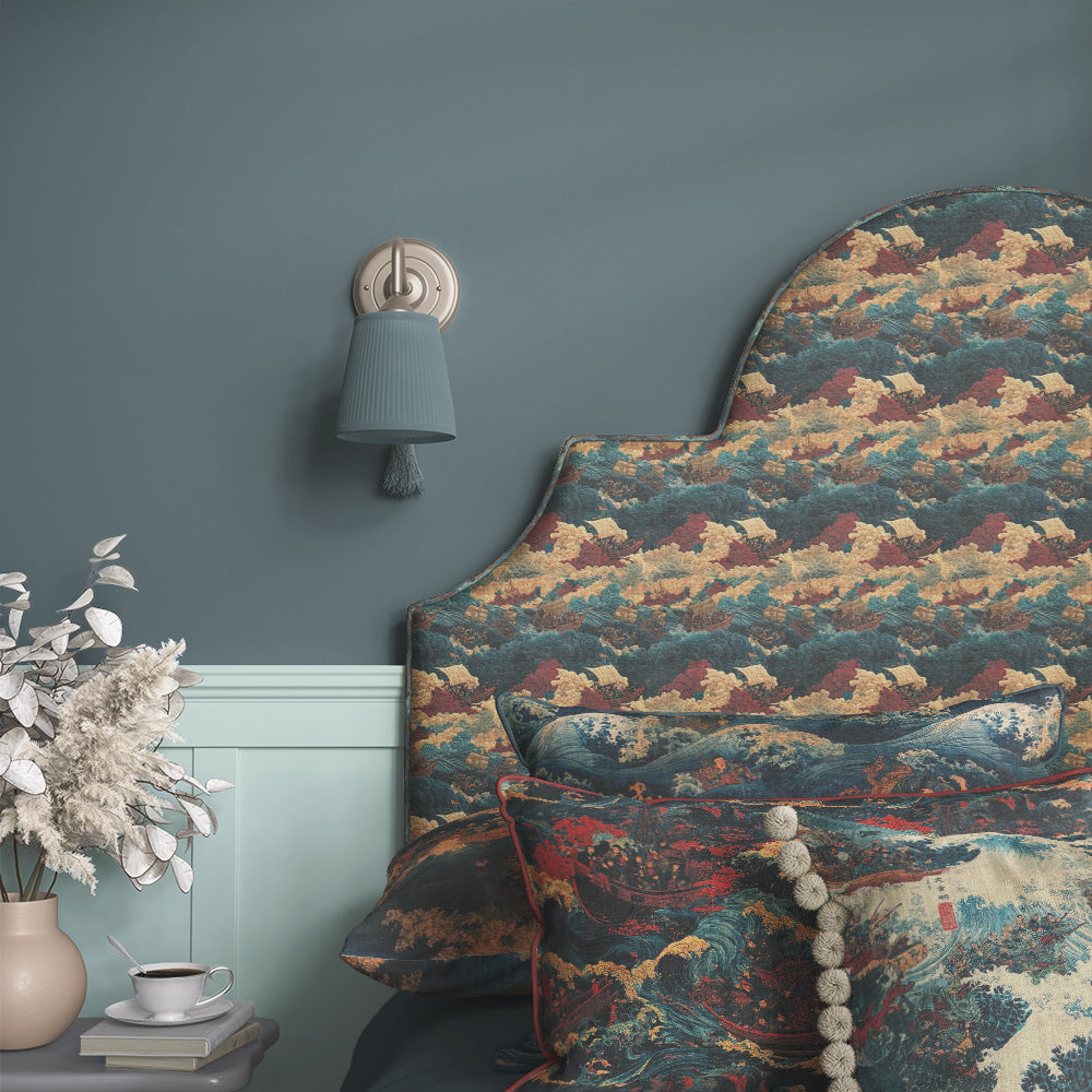 Ukiyo No.1 Japanese style upholstery fabric on upholstered headboard with blue ocean waves, sailing ships and traditional Japanese inspired design