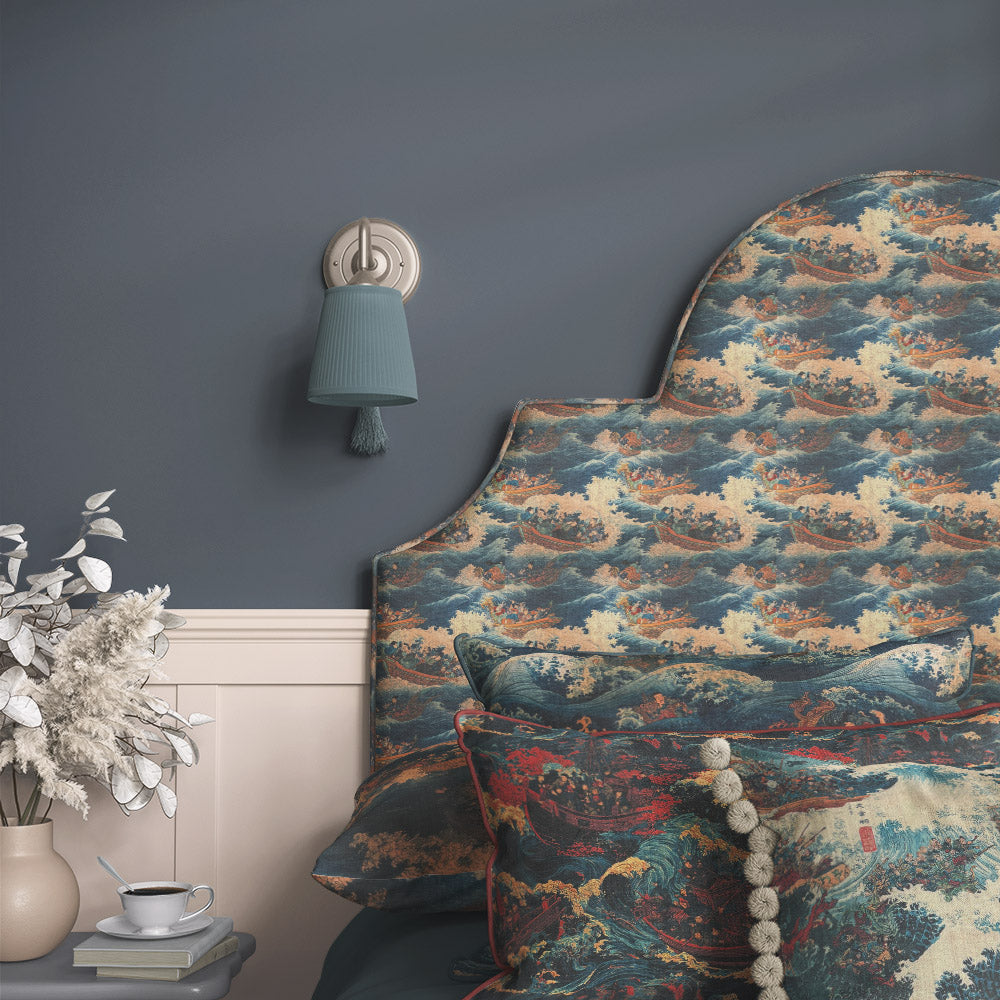Ukiyo No.2 Japanese style upholstery fabric displayed on upholstered headboard with stormy sea waves and traditional maritime artwork
