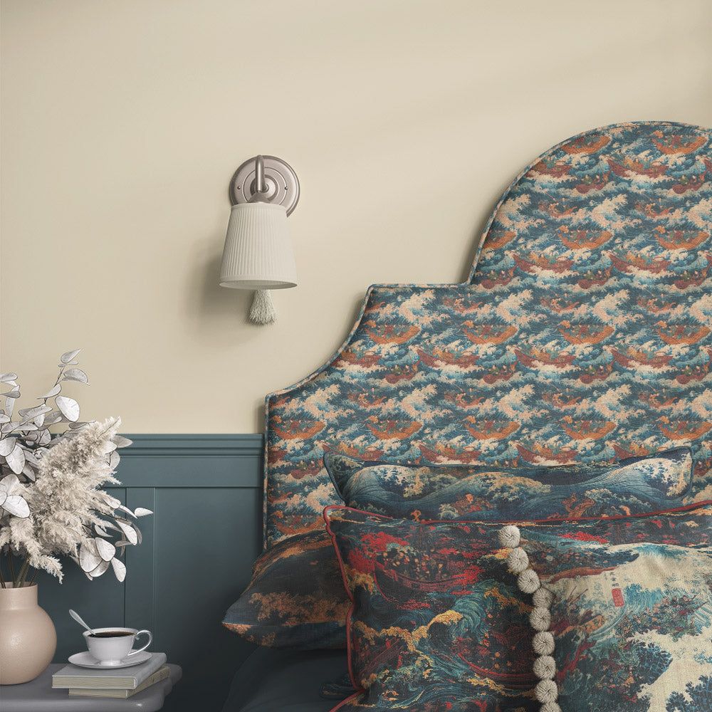 Ukiyo No.4 Japanese style upholstery fabric displayed on upholstered headboard with traditional sailing boats, rolling waves and historic maritime design