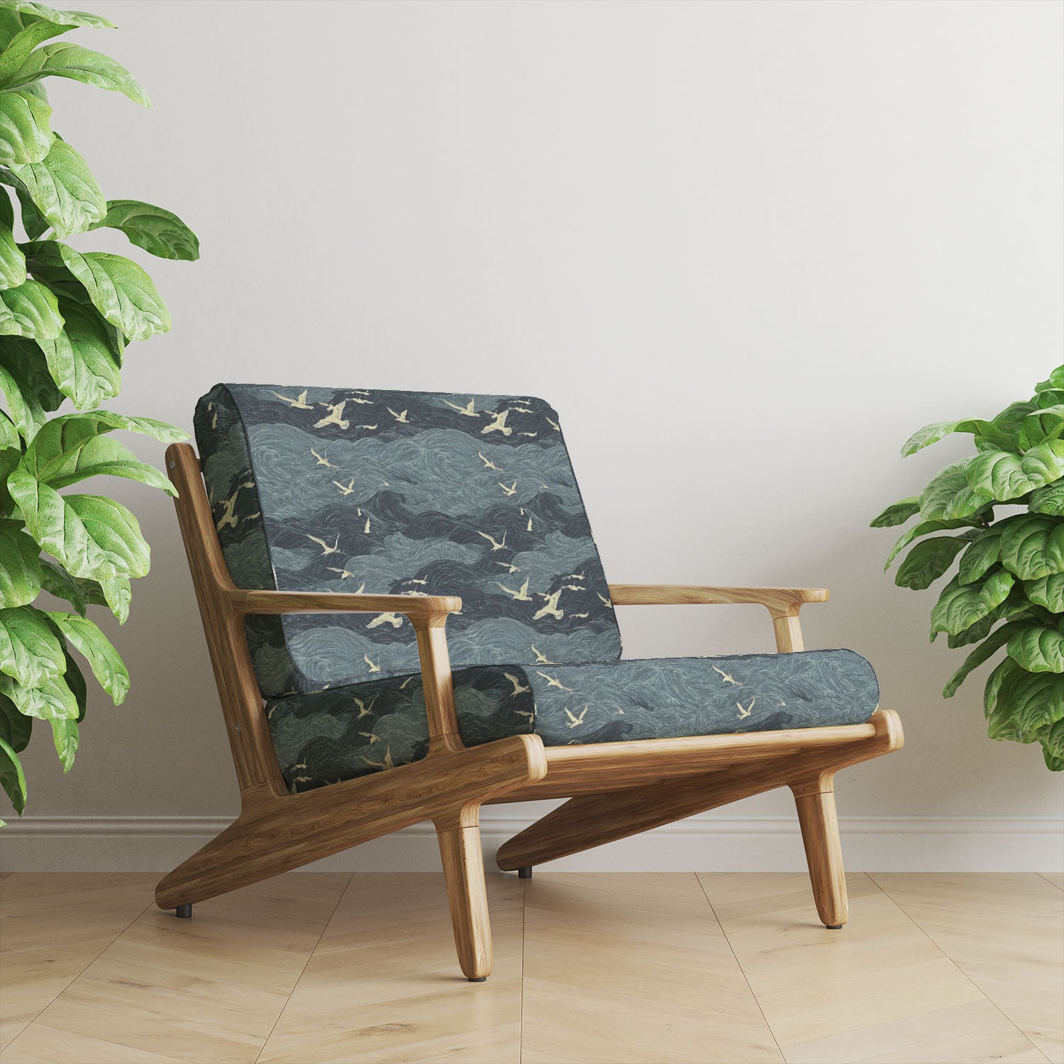 Wave upholstery fabric with ocean and bird pattern in deep blue tones, ideal for statement furniture and contemporary interiors.