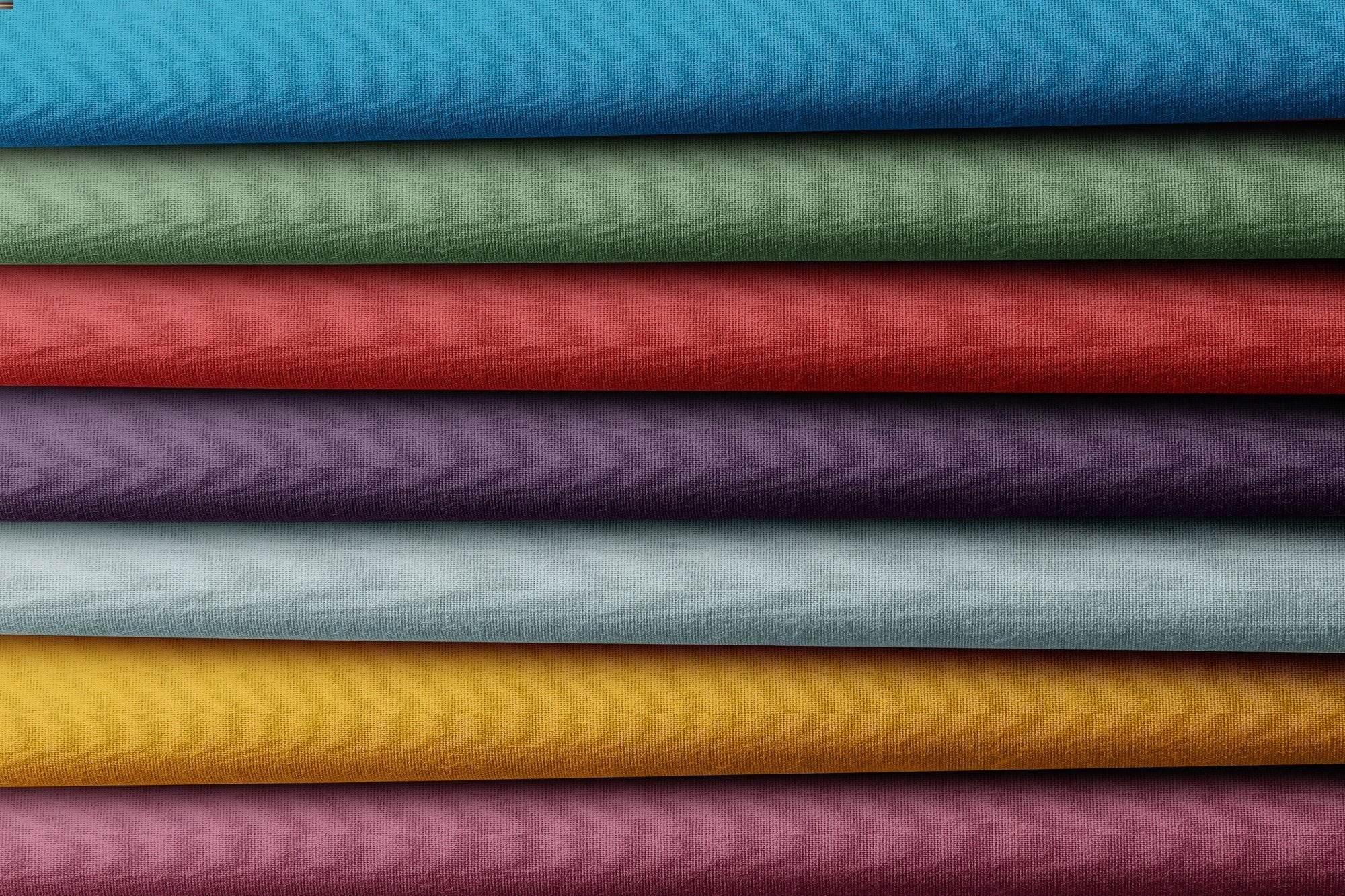 Palermo plain weave upholstery fabric showing subtle texture and refined neutral colour