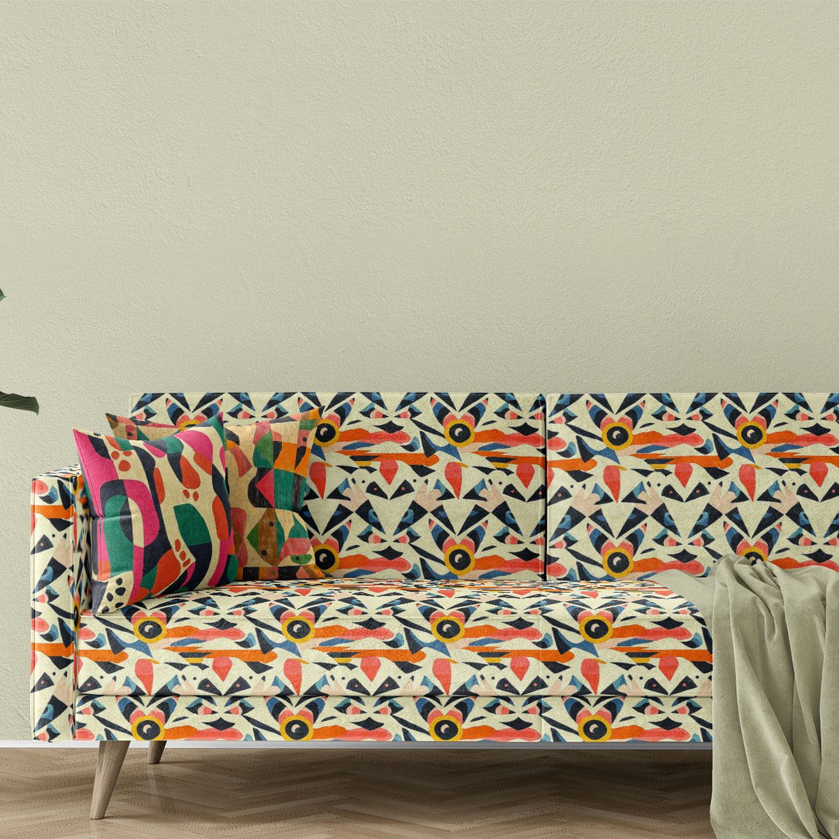 Modern sofa upholstered in Abstract No.16 angular cream and coral printed velvet