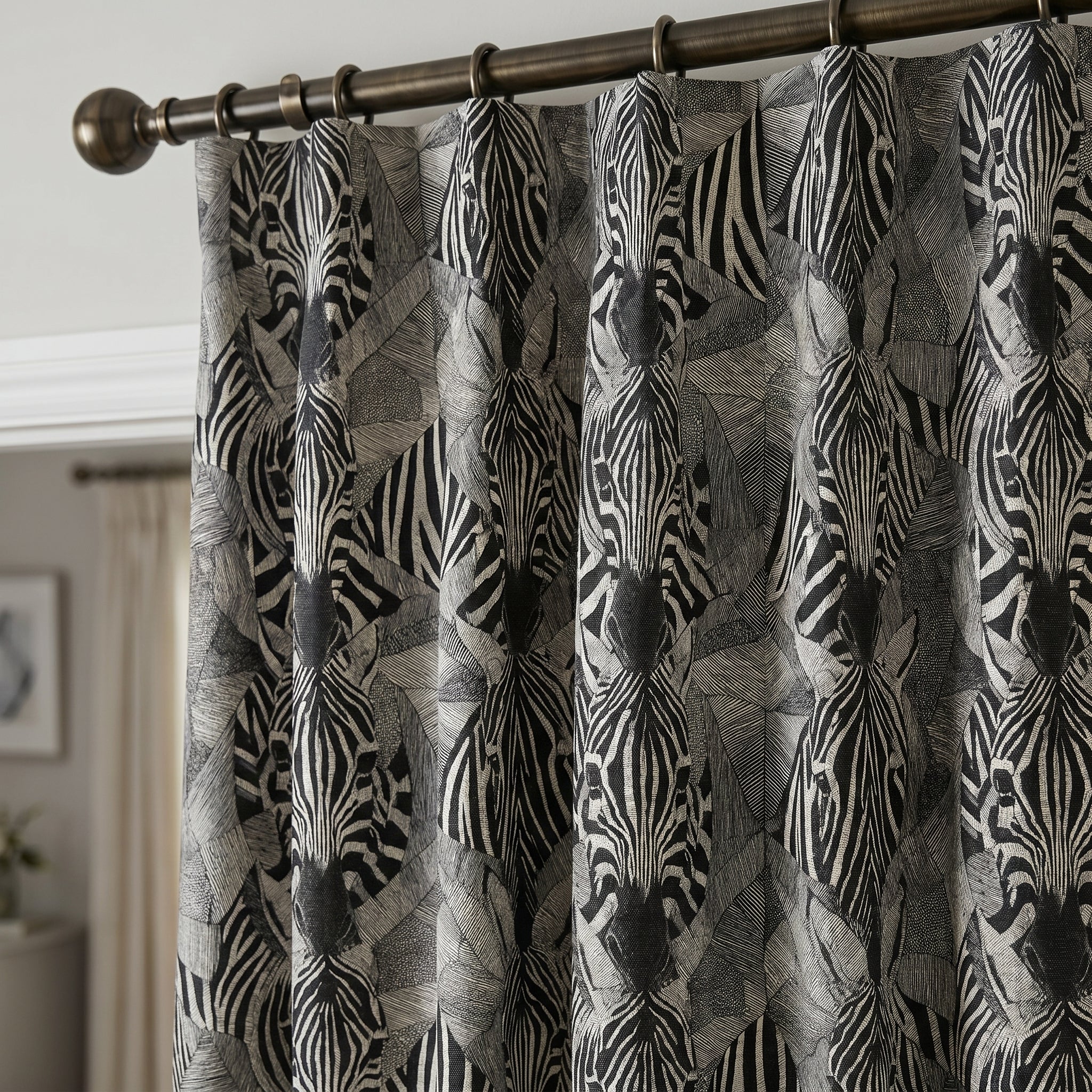 Animals No.7 linen curtain fabric shown as bold black zebra patterned curtains