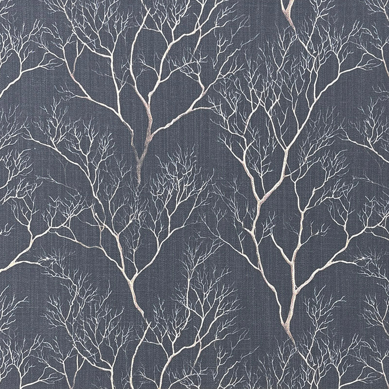 Woodland style upholstery fabric featuring delicate winter tree branches in ivory on a slate blue background printed on premium upholstery fabric