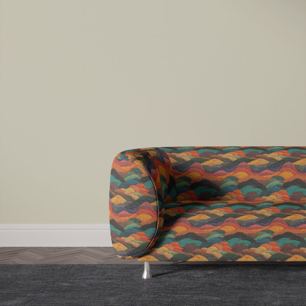 Sculptural sofa upholstered in Arcadia No.11 multicoloured upholstery fabric with vibrant painterly design