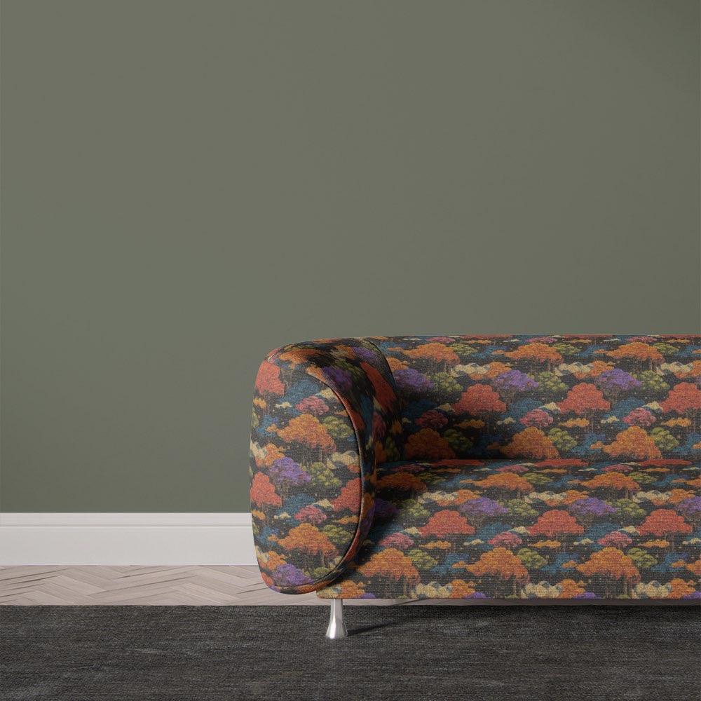 Arcadia No.7 upholstery fabric used on a modern sofa with colourful woodland design on black