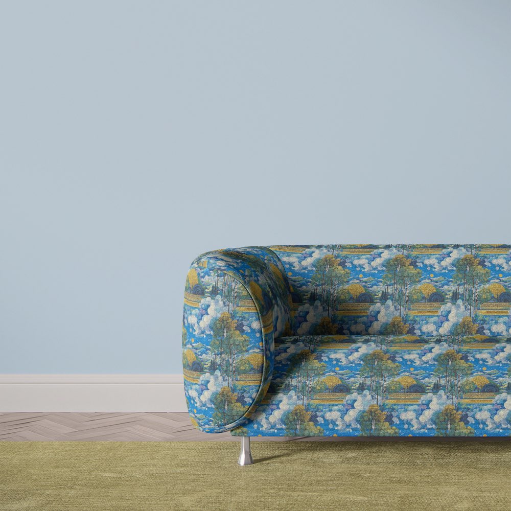 Arcadia No.8 upholstery fabric on modern sofa in vibrant blue scenic pattern