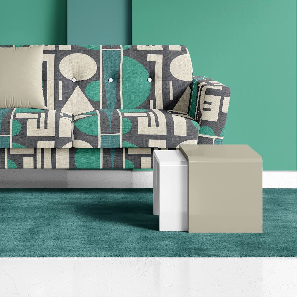 Ruffled view of Avant No.1 upholstery fabric in teal green, black, and natural with cubism pattern