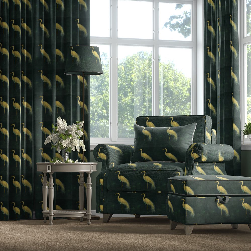 Velvet bird fabric used on armchair, ottoman and curtains with golden heron pattern on dark green velvet – Aviary No.3 velvet bird fabric