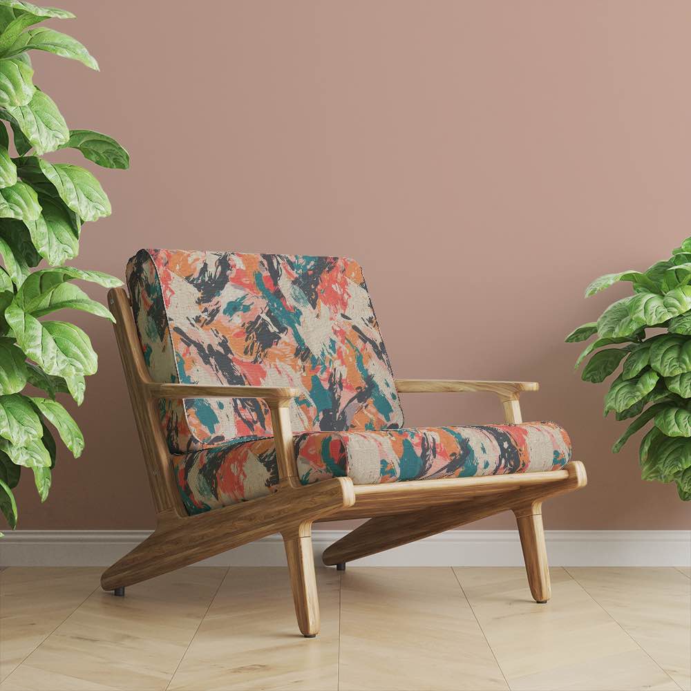 Accent chair upholstered in Dash No.1 brushstroke print fabric with multicolour abstract painterly pattern