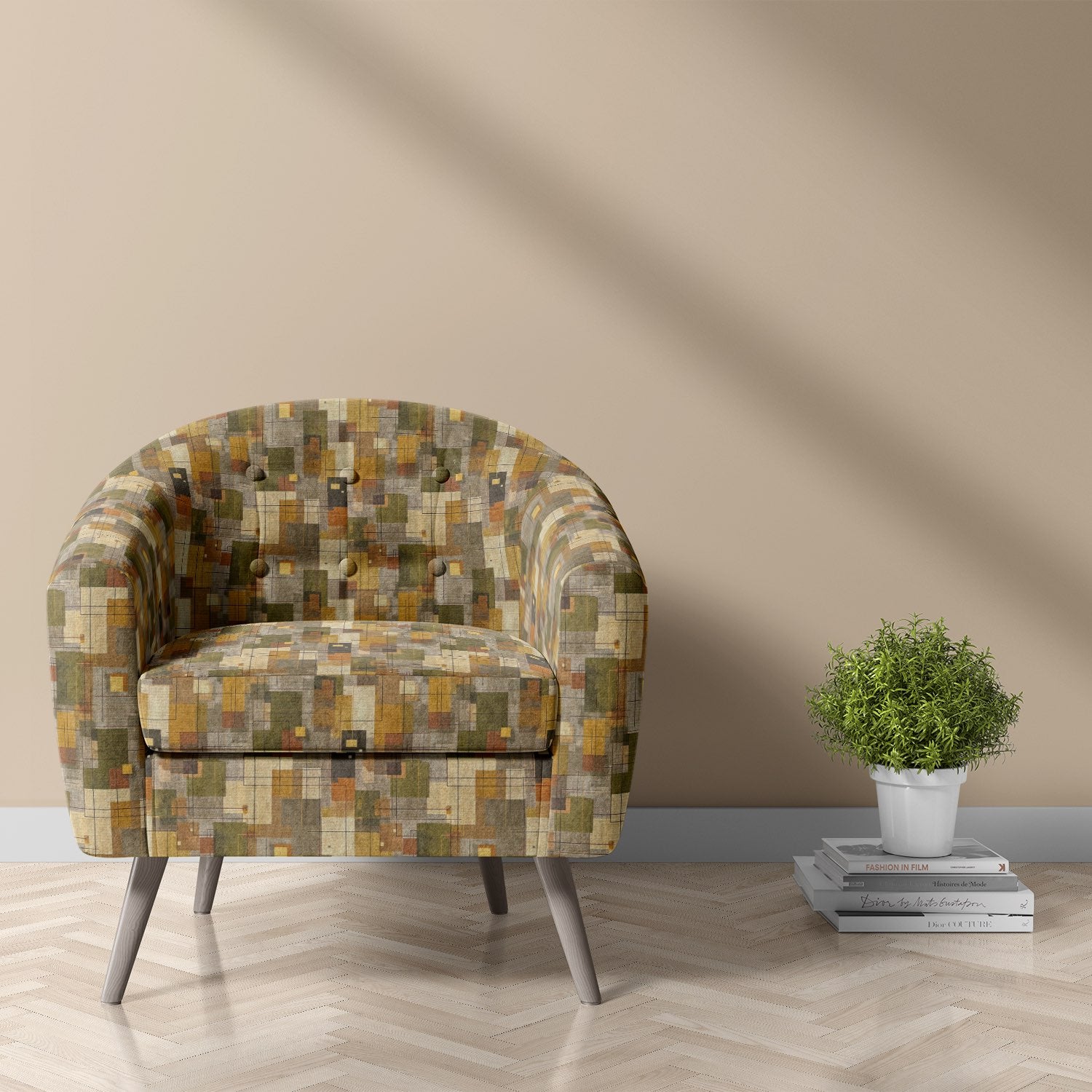Armchair upholstered in multicoloured geometric upholstery fabric – Dessau No.18 in a modern interior setting
