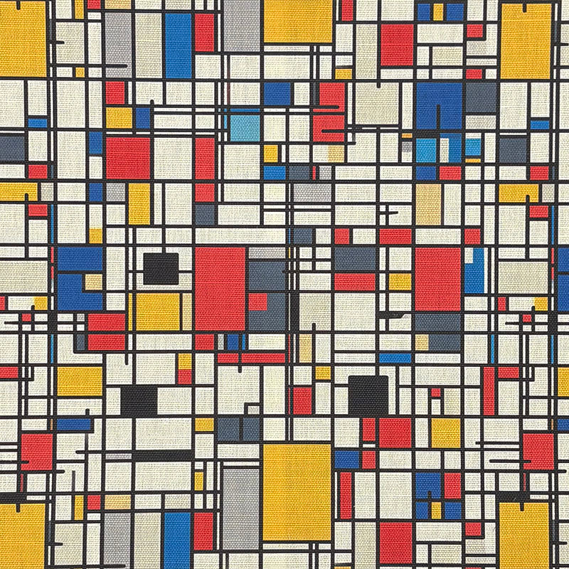 Close-up of Dessau No.22 multicoloured upholstery fabric featuring structured red, blue, yellow and grey rectangles on a linen-look base