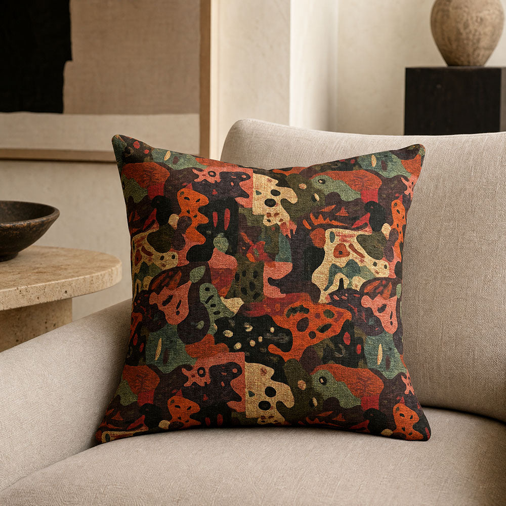 Fauve No.17 rust and green abstract upholstery fabric made into a statement cushion