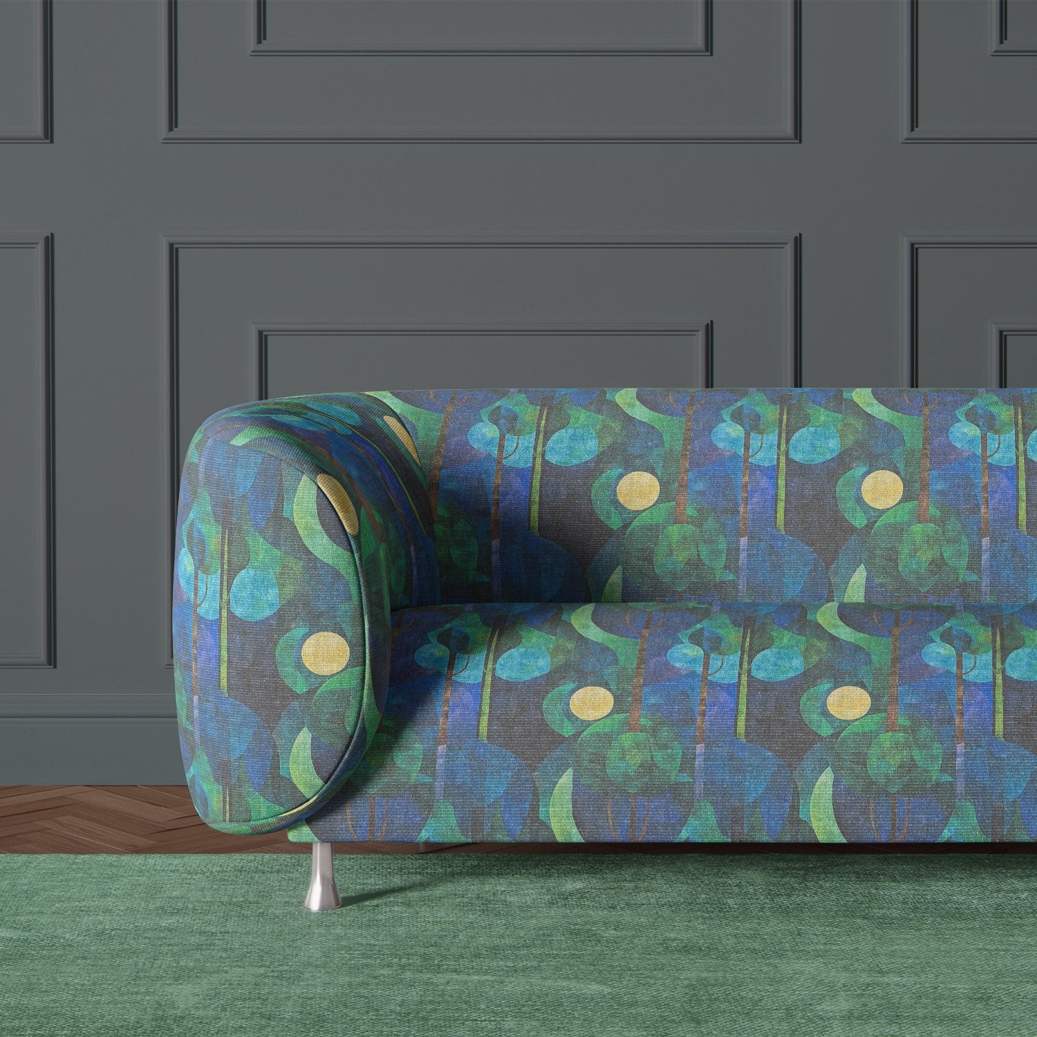 Armchair upholstered in Figueres No.9 blue and green scenic upholstery fabric with moon and tree motifs