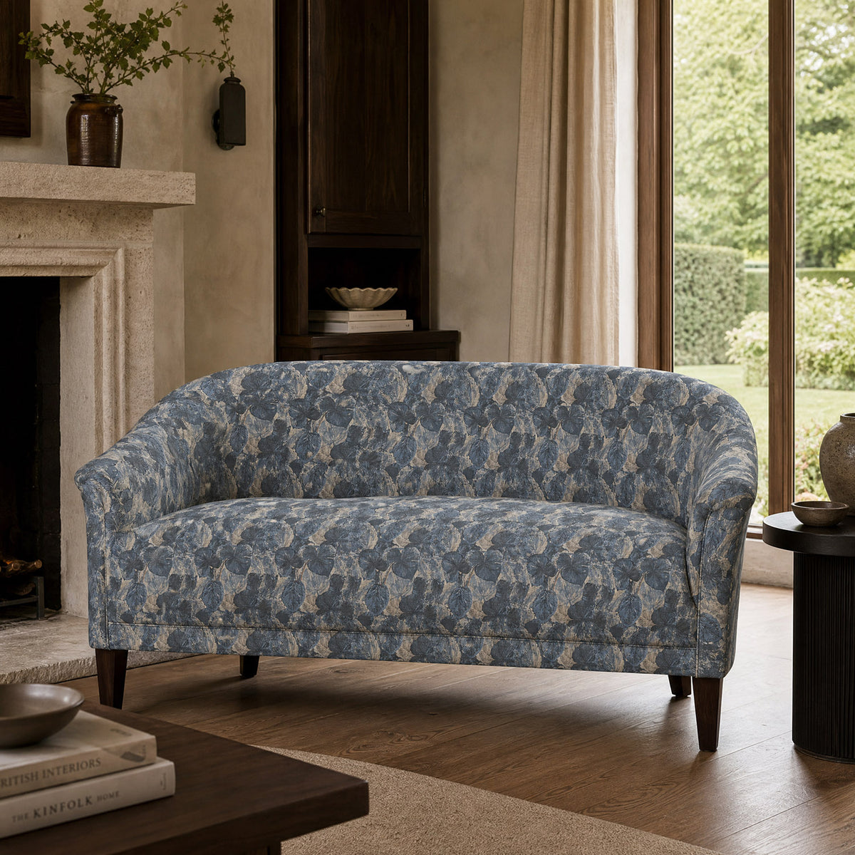 Foliage Leaf No.13 blue grey leaf upholstery fabric styled on a contemporary sofa