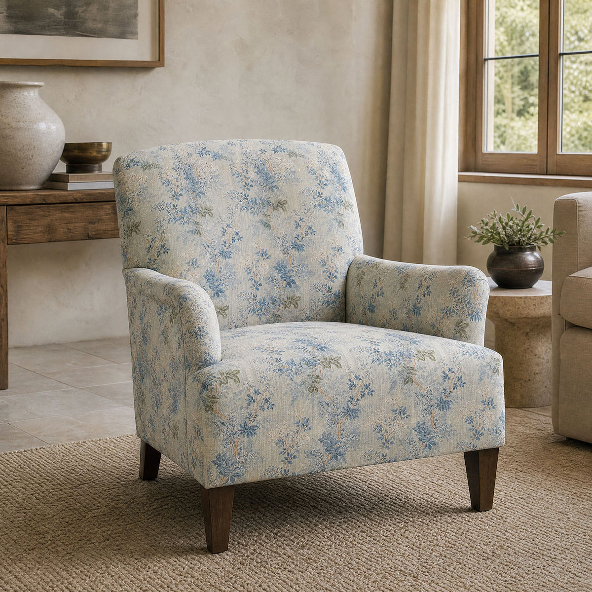 Foliage Leaf No.3 blue botanical upholstery fabric displayed on a classic armchair